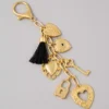 AEO Gold Toned Locket Bag Charm Gold